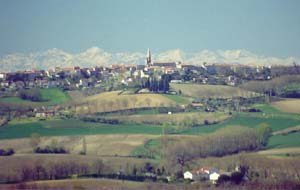 Puylaurens with the Pyrnes in the distance